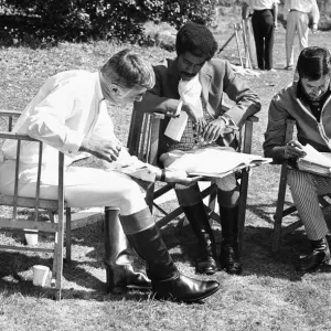 Director Jerry Lewis (right) seen here reading the script with Sammy Davis Junior Director Jerry Lewis (right) seen here reading the script with Sammy Davis Junior