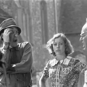 Director John Sturges (right) seen here in conversation with Donald Sutherland while Director John Sturges (right) seen here in conversation with Donald Sutherland while