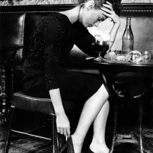 Disaster... Drink can kill (posed by a model). Hangover this women is feeling Disaster... Drink can kill (posed by a model). Hangover this women is feeling