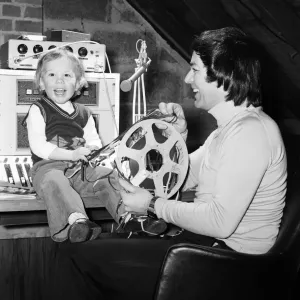 Disc Jockey Tony Blackburn and his son Simon, 3, in their private recording studio in Disc Jockey Tony Blackburn and his son Simon, 3, in their private recording studio in