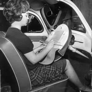 A dispatch case that unzips to fit over a car steering wheel converting it into a solid