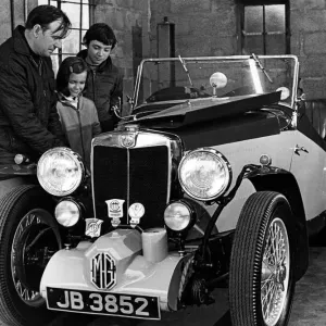 Print of a 1977 photograph featuring a display of veteran MG cars