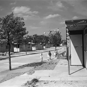 Dockland Houses, Isle of Dogs. Families set up home in pre-fabricated houses, Circa 1946 Dockland Houses, Isle of Dogs. Families set up home in pre-fabricated houses, Circa 1946