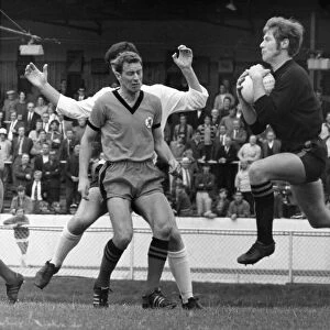 Donald MacKay Dundee United goalkeeper catches the ball as team mate centre half Doug