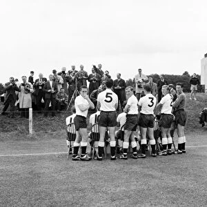 The double winning Tottenham Hotspur Football Club line up for photographers at Cheshunt