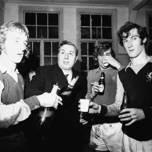 Doug Ellis seen here with members of Aston Villa celebrating in the dressing room