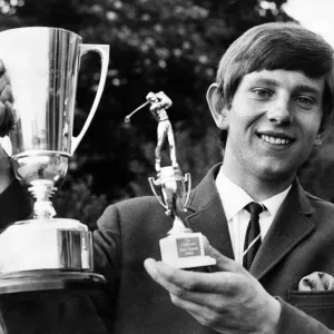 Doug McClelland, proudly holds The Journal Trophy which he keeps for a year Doug McClelland, proudly holds The Journal Trophy which he keeps for a year