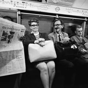 Print of Dr Agrell with moon dust samples on the tube