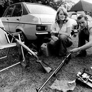 Dr. Anton Aspin aged 29, with Sally Lowe aged 27, outside their Caravan at the Bisley