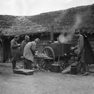 Dr. Eugene Hurd inspect the kitchen stove, giving orders to the soldier cook in very bad Dr. Eugene Hurd inspect the kitchen stove, giving orders to the soldier cook in very bad