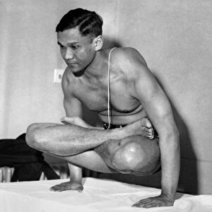 Dr. Mukerji demonstrates a Yoga posture for strengthening the muscles of the abdomen