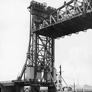 The dredger Wilton seen here passing under the Newport lifting bridge. 9th July 1971