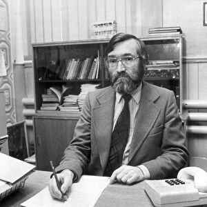 Drummond Middle School headmaster Ray Honeyford at his desk. 17th September 1985