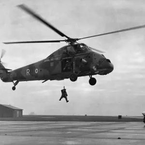 Dry winching drill. A Westland Wessex HC2 helicopter of 75 Squadron which is standing in Dry winching drill. A Westland Wessex HC2 helicopter of 75 Squadron which is standing in