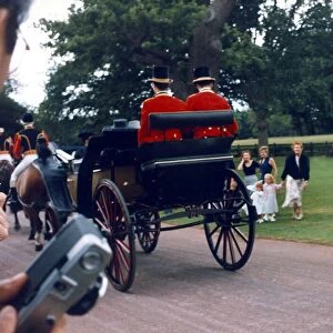 Duchess of York with her family as the Queens carriage sweeps past