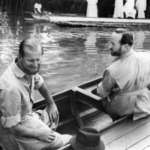 The Duke of Edinburgh Feb 1957 and Lt. Commander Michael Parker in a canoe at Gambia The Duke of Edinburgh Feb 1957 and Lt. Commander Michael Parker in a canoe at Gambia