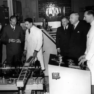 The Duke of Edinburgh inspects a machine for load-testing splines in the laboratory of The Duke of Edinburgh inspects a machine for load-testing splines in the laboratory of