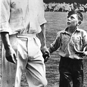 The Duke of Edinburgh. Prince Philip with an unknown child. 1950 s