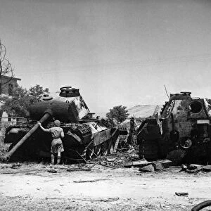 A dump of enemy equipment knocked out on Route 4, 25 kilometres north of Rome