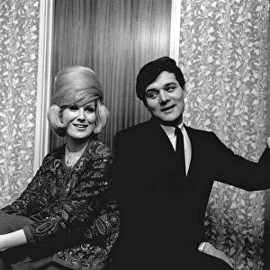 Dusty Springfield singer with pop star Eden Kane Feb 1964 in her dressing room at