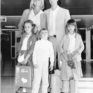 Dutch footballer Johann Cruyff with his wife Danny and their three children on the way to