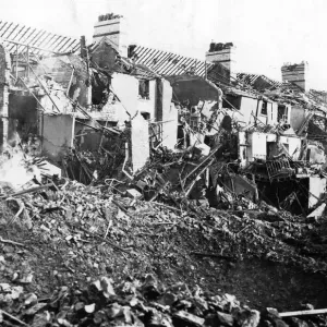 Dwellings damaged following a Nazi raid on a South Wales town. Circa 1941 Dwellings damaged following a Nazi raid on a South Wales town. Circa 1941
