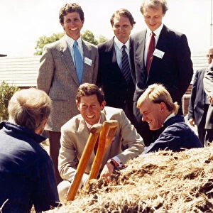 Down to earth, Prince Charles chats to the gardeners at the Botanical Gardens