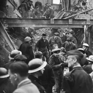 East Lane, Walworth. Man rescued from debris quite conscious with only one thought