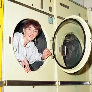 EastEnders star June Brown in a launderette. 6th February 1997