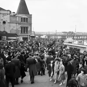 Easter Monday holiday crowds at the entrance to Tower Grounds, New Brighton, Merseyside Easter Monday holiday crowds at the entrance to Tower Grounds, New Brighton, Merseyside