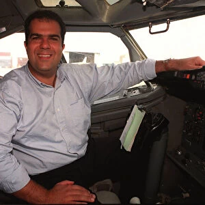 Easyjet owner Stelios Haji-Loannou sitting at aeroplane controls October 1997