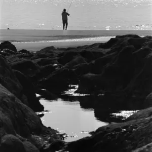 Ebbw Vale, Wales. Sea angler tries his luck off the mumbles of Ebbw Vale, 11th March 1971 Ebbw Vale, Wales. Sea angler tries his luck off the mumbles of Ebbw Vale, 11th March 1971