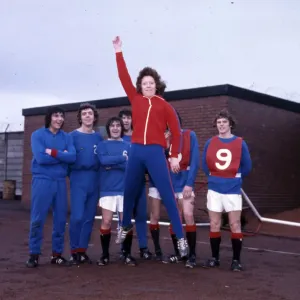 Edna Neillis sport football women 1975 jumping with Rangers players in Edna Neillis sport football women 1975 jumping with Rangers players in