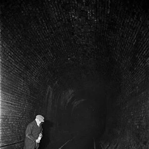 Edward Farmer and his gang seen here underground cleaning scraps of paper