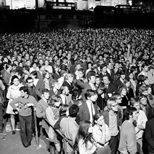 Election night scene in Trafalgar Square as people watch Ted Heath