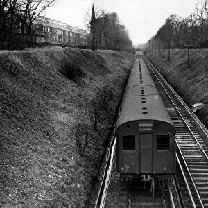An electric train running through the suburbs of Newcastle on 3rd Mary 1958