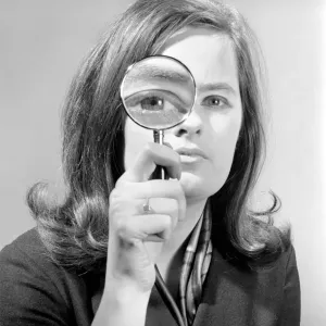 Vintage Print of Woman Holding Magnifying Glass