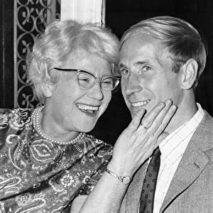 Elizabeth Charlton, affectionately known as Cissie, congratulates her son Bobby Charlton