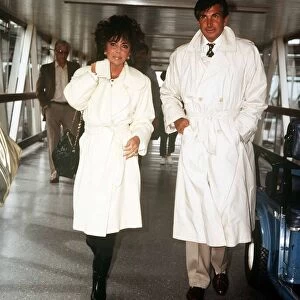 Elizabeth Taylor actress August 1986 at Heathrow Airport with George Hamilton