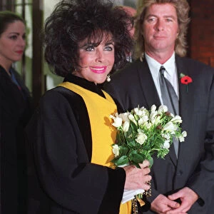 ELIZABETH TAYLOR, ACTRESS, WITH HER HUSBAND LARRY FORTENSKY - 11 / 06 / 1991