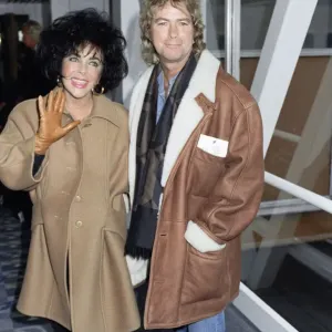 Elizabeth Taylor with Larry Fortensky at Heathrow Airport Print Elizabeth Taylor with Larry Fortensky at Heathrow Airport Print