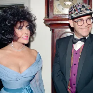 Elizabeth Taylor and Elton John at a gala dinner in aid of the AIDS Crisis Trust in Elizabeth Taylor and Elton John at a gala dinner in aid of the AIDS Crisis Trust in