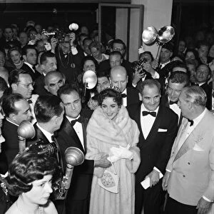 Elizabeth Taylor and husband, film producer Mike Todd, pictured on opening night of