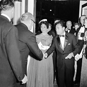 Elizabeth Taylor and Husband Mike Todd March 1957 at the Premere of Around the World in
