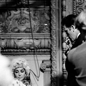 Elizabeth Taylor and Richard Burton on the television set where Richard is filming a