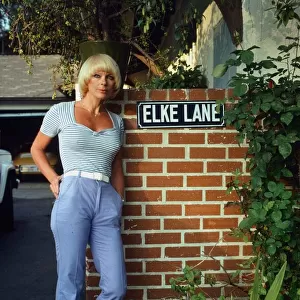 Elke Sommer Actress leaning on wall - October 1980 Dbase MSI
