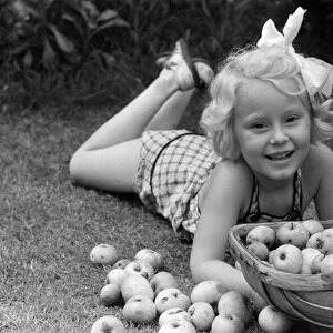 Ella Edwards with a fruit basket. October 1941