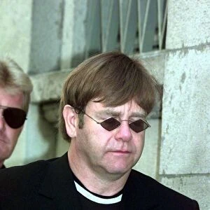 Elton john arrives at Gianni Versace memorial 22 / 07 / 97. The service was held in Italy