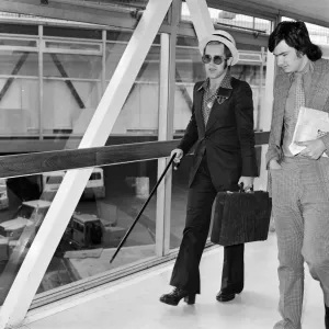 Elton John arrives at Heathrow airport from Arizona where he has been on holiday Elton John arrives at Heathrow airport from Arizona where he has been on holiday
