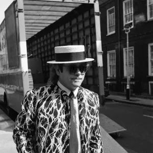 Elton John arriving at court. Elton is asking for a bigger share of the 20 million his Elton John arriving at court. Elton is asking for a bigger share of the 20 million his